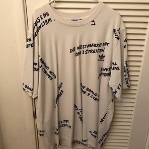 Adidas “The Brand with the Three Stripes” tee